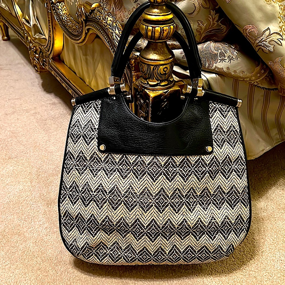 Banana Republic Authentic Woven bag with Leather and antique gold hardware.